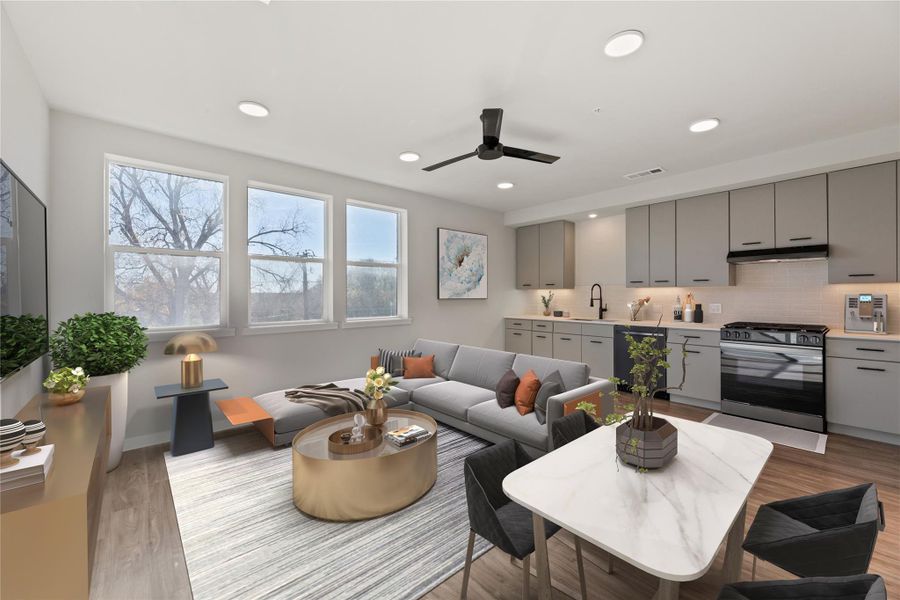 Living area featuring a ceiling fan, light wood finished floors, recessed lighting, and baseboards