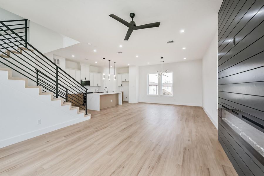 The living room opens up to the dining room. The living room opens up to the dining room.
