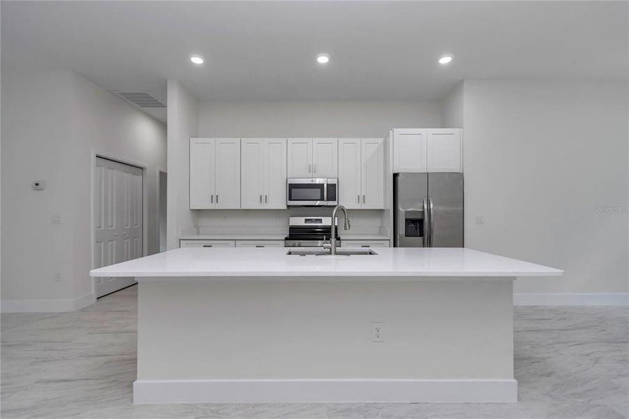 Furnished interior view inside a new home in , Dunnellon (Image 5).