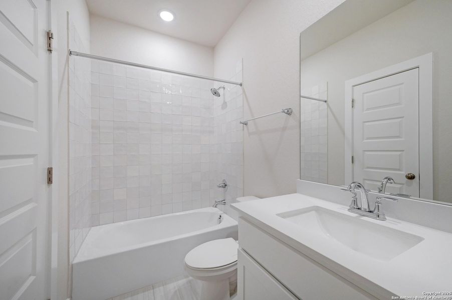 Furnished interior view inside a new home in Crown Ridge Manor, San Antonio (Image 10).