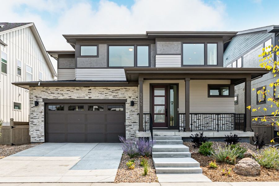 Front exterior of a new home in West Grange, Longmont, CO, highlighting curb appeal (Image 1).