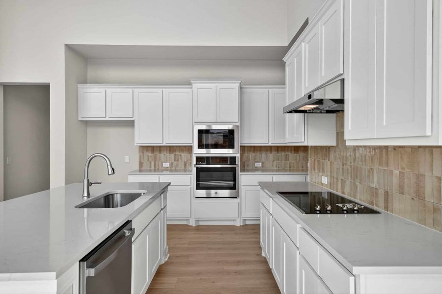 Furnished interior view inside a new home in Whisper Valley, Manor (Image 7).
