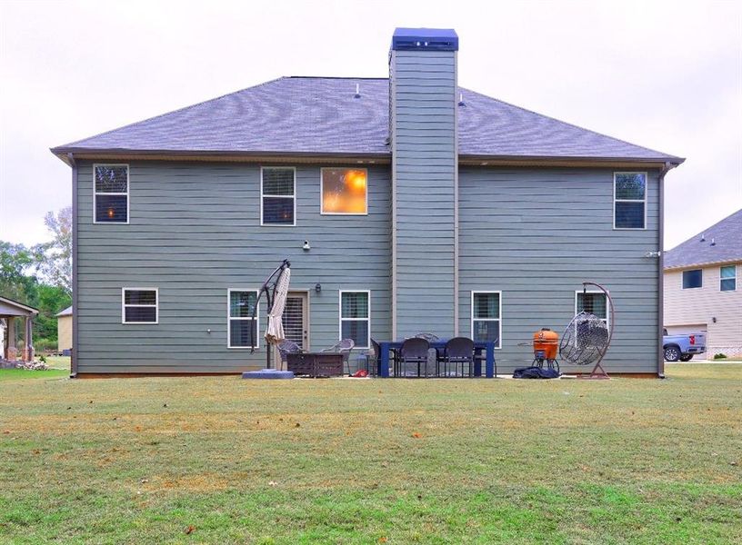 Exterior details and patio area of a home in Nine Oaks, Locust Grove (Image 3). Exterior details and patio area of a home in Nine Oaks, Locust Grove (Image 3).