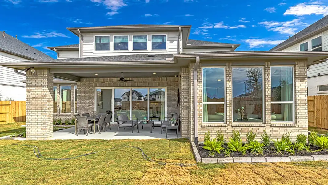 Exterior details and patio area of a home in Avalon at Cypress, Cypress (Image 21).