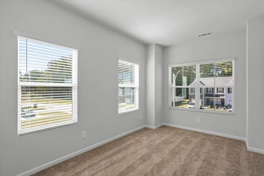 Spacious, unfurnished interior of a new home in West Main Townhomes, Sanford (Image 20).