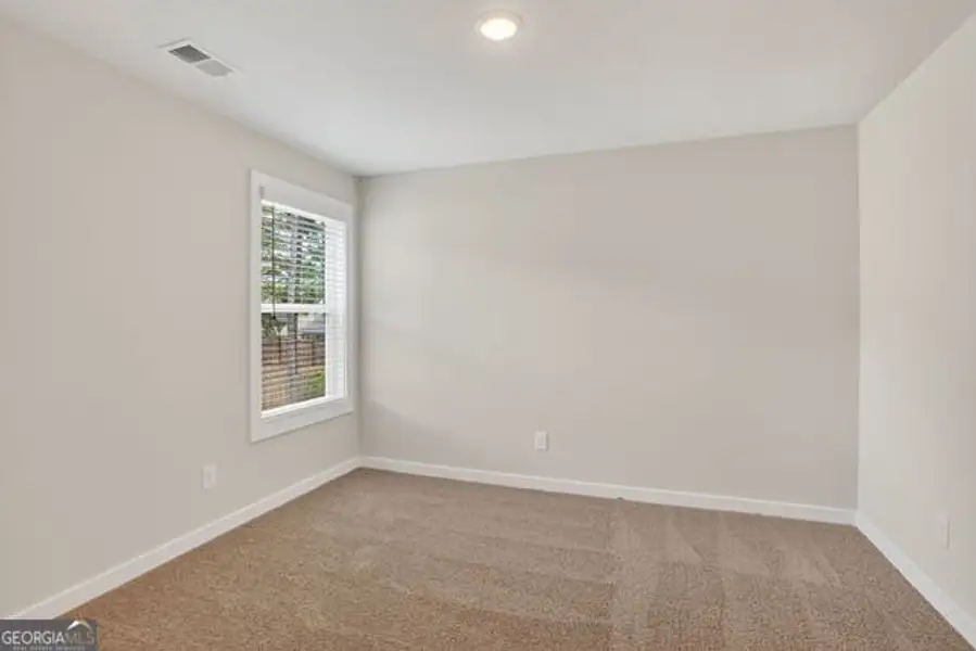 Spacious, unfurnished interior of a new home in Killian Manor at The Adares, Adairsville (Image 32).