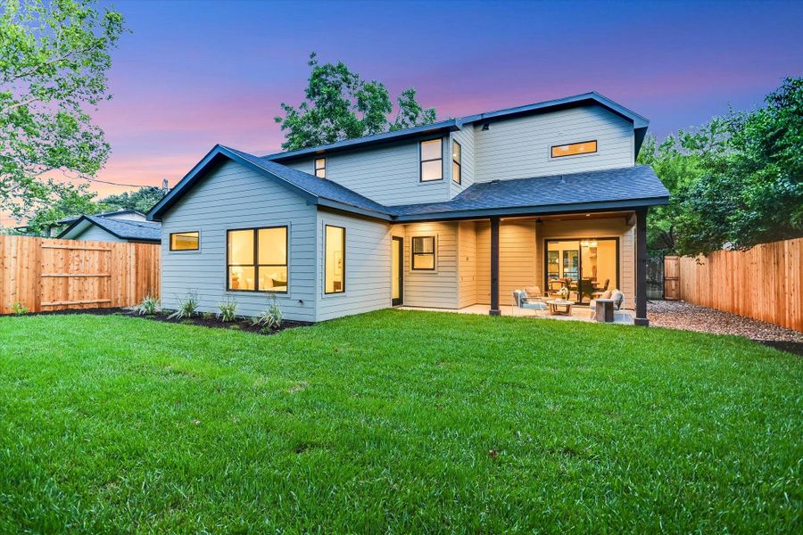 Spacious level backyard perfect for outdoor relaxation, games, or your potential future swimming pool! Spacious level backyard perfect for outdoor relaxation, games, or your potential future swimming pool!