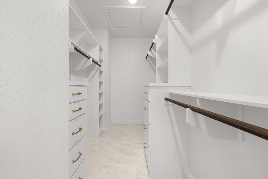 Walk in closet with attic access
