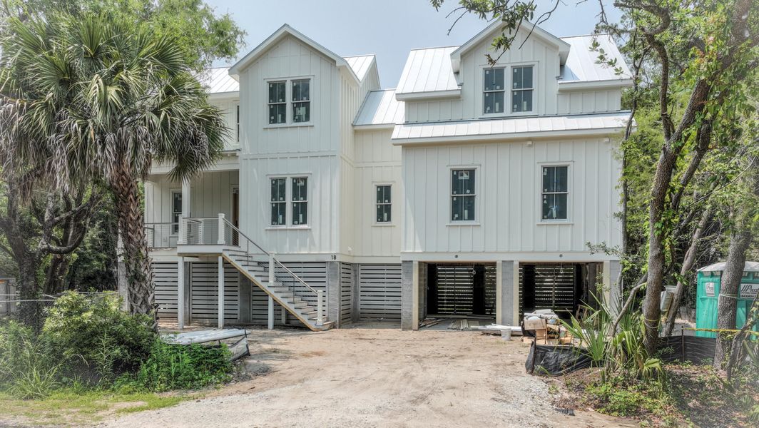 Front exterior of a new home in , Isle Of Palms, SC, highlighting curb appeal (Image 36). Front exterior of a new home in , Isle Of Palms, SC, highlighting curb appeal (Image 36).