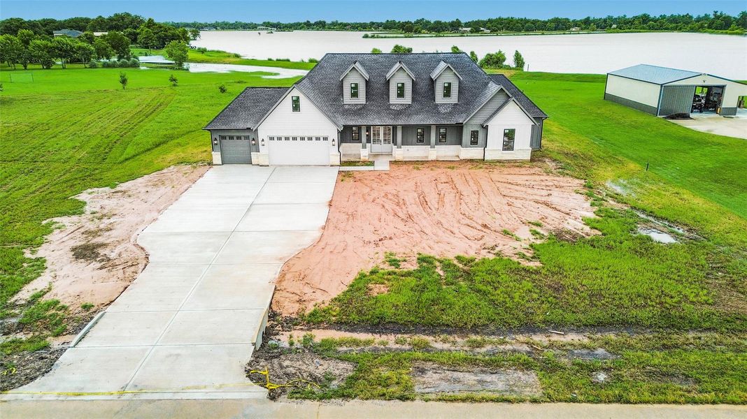 Front exterior of a new home in , Angleton, TX, highlighting curb appeal (Image 1). Front exterior of a new home in , Angleton, TX, highlighting curb appeal (Image 1).