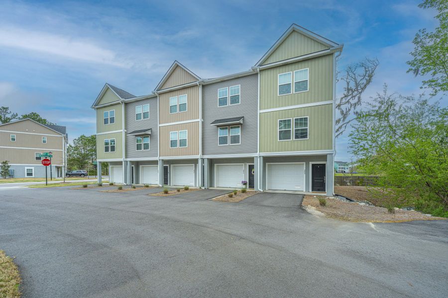 Front exterior of a new home in , Charleston, SC, highlighting curb appeal (Image 23).
