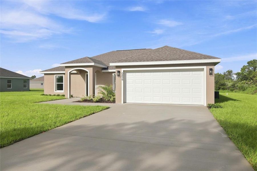 Front exterior of a new home in , Sebring, FL, highlighting curb appeal (Image 18).