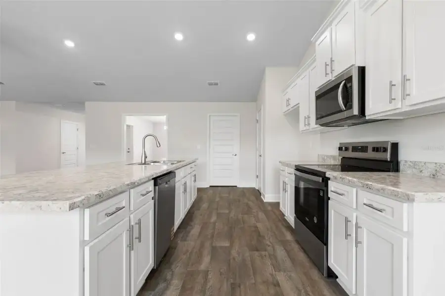 Representative furnished interior of a home built from the 2117 by Adams Homes in Flagler Estates, Hastings (Image 6).