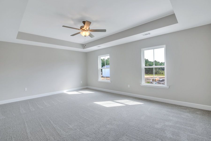 Seabrook Owner's Suite with Tray Ceiling and Large Windows