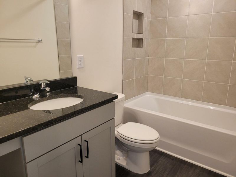 Furnished interior view inside a new home in 1158 Place, Wilson (Image 5).