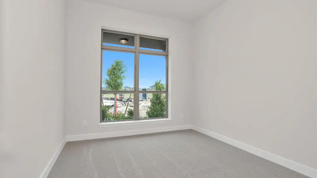 Spacious, unfurnished interior of a new home in Bridgeland, Cypress (Image 11).