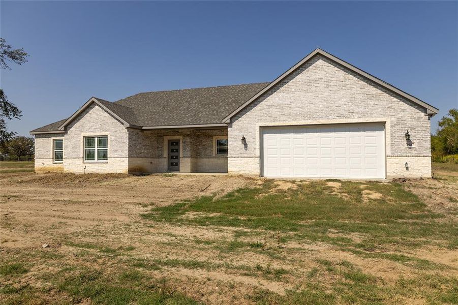 Brand new custom home - enjoy country living close to the city.