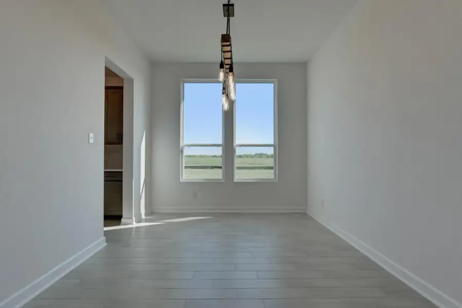 Representative unfurnished interior of a home built from the Kerrville by Ashton Woods in Saddlebrook Ranch, Schertz (Image 27).