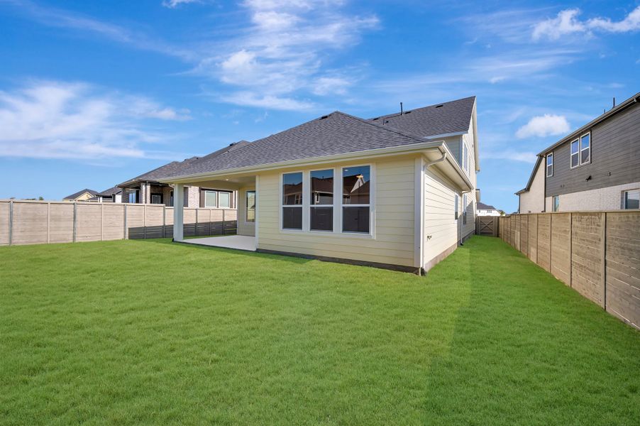 Exterior details and patio area of a home in Treeline, Justin (Image 20).