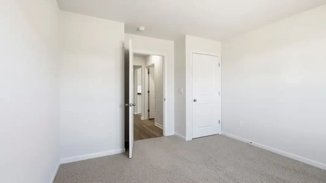 Spacious, unfurnished interior of a new home in Waverly Station, Greenwood (Image 23).