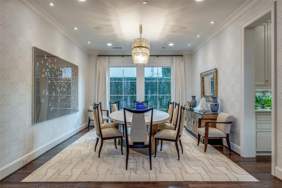 Dining room with art lighting and vintage chandelier