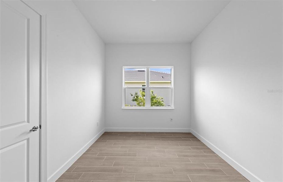 Spacious, unfurnished interior of a new home in BeachWalk by Manasota Key, Englewood (Image 22).