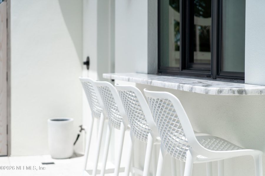 Exterior details and patio area of a home in , Palm Coast (Image 42).