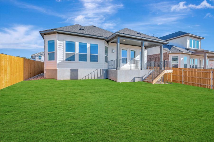 Exterior details and patio area of a home in Heritage, Dripping Springs (Image 20).