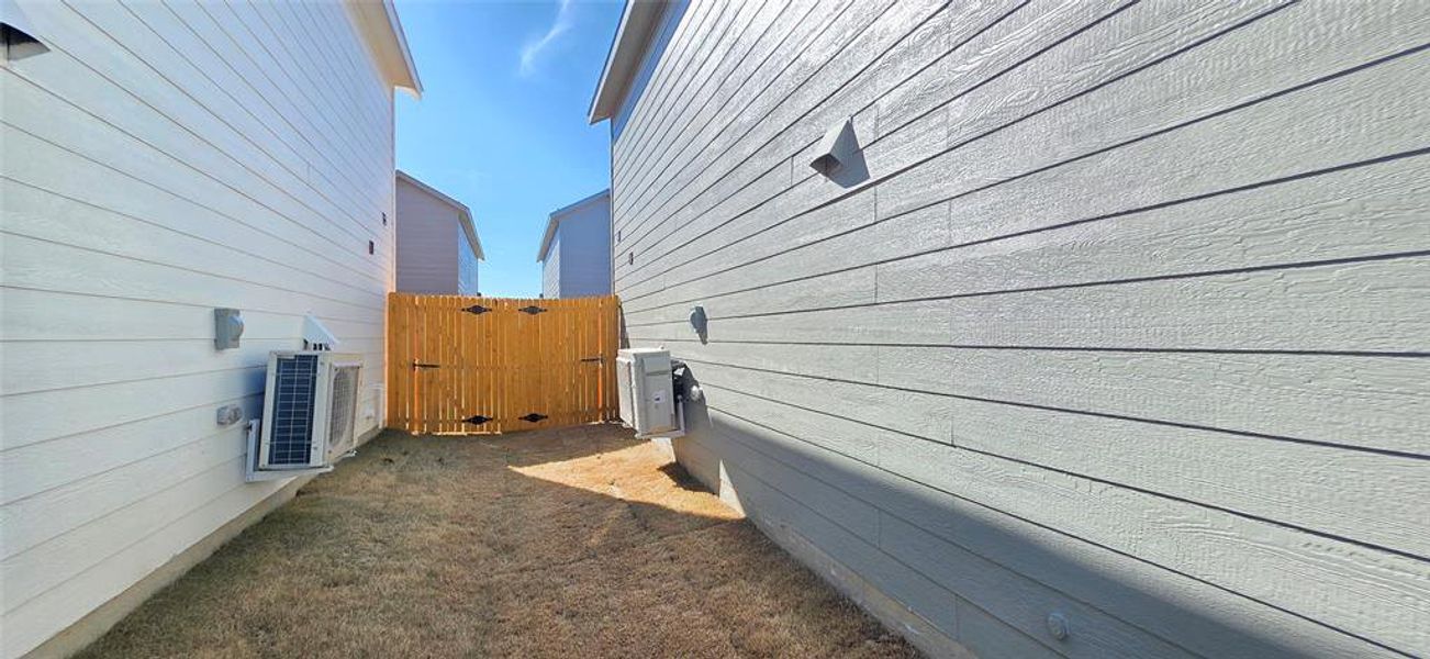 Exterior details and patio area of a home in Tillage Farms, Princeton (Image 16). Exterior details and patio area of a home in Tillage Farms, Princeton (Image 16).