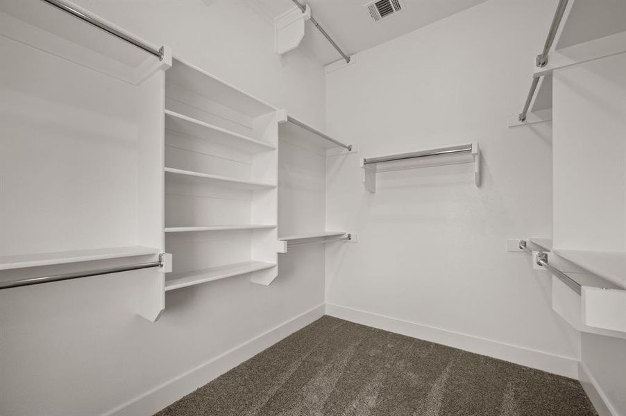 You'll find a wonderful owners closet complete with seasonal hanging racks in our Bella plan.