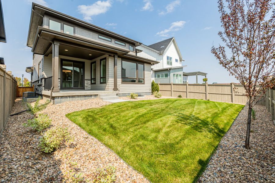 Front exterior of a new home in West Grange, Longmont, CO, highlighting curb appeal (Image 25).