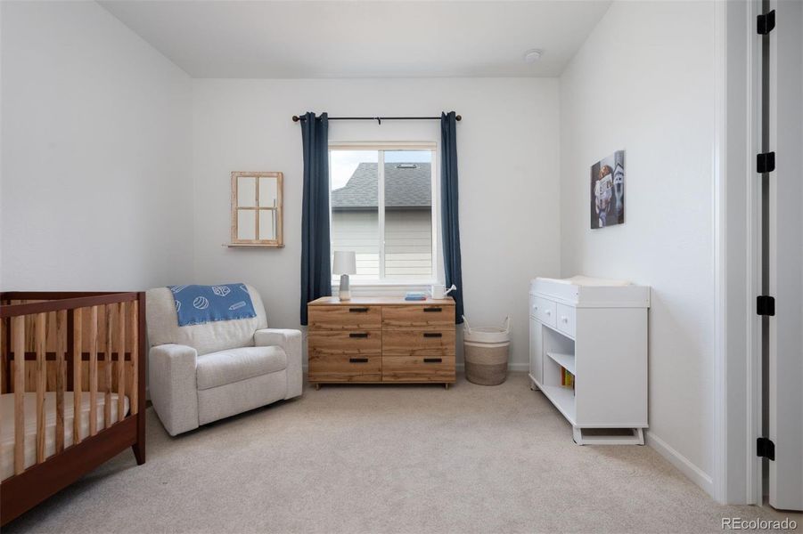 Furnished interior view inside a new home in Trailstone Destination Collection, Arvada (Image 9).