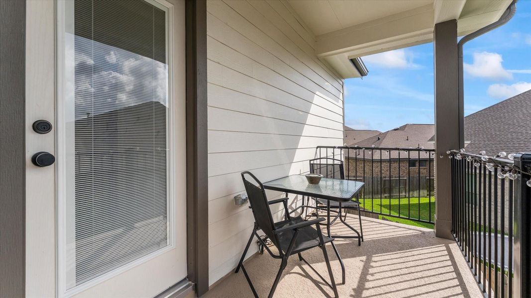 Exterior details and patio area of a home in Balmoral, Humble (Image 4).