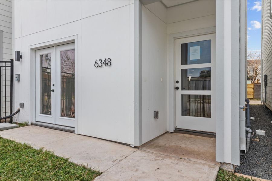 Front exterior of a new home in , Houston, TX, highlighting curb appeal (Image 17).