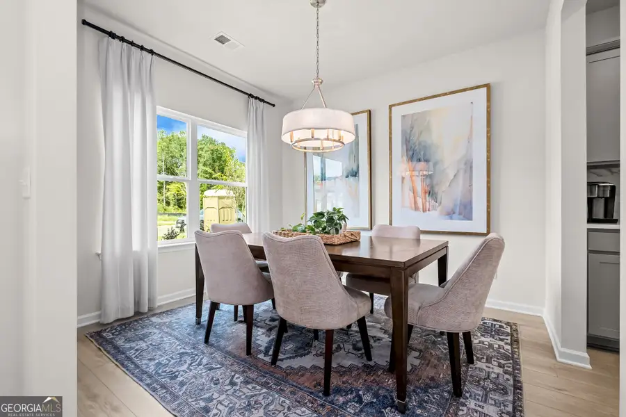 Furnished interior view inside a new home in Cobblestone Crossing Commons, Warner Robins (Image 3).