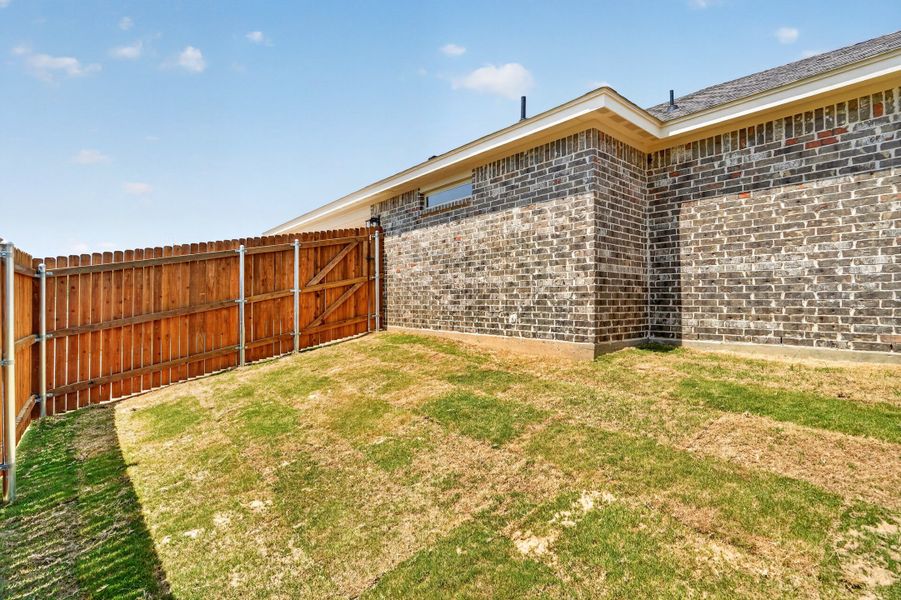 Exterior details and patio area of a home in Trail Creek, Cleburne (Image 29).