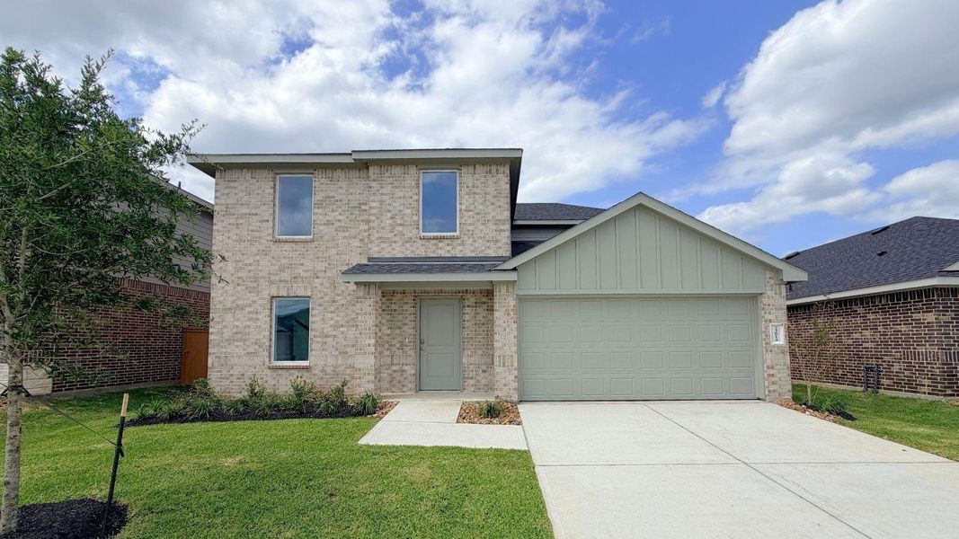 Front exterior of a new home in Cypress Green, Hockley, TX, highlighting curb appeal (Image 1). Front exterior of a new home in Cypress Green, Hockley, TX, highlighting curb appeal (Image 1).
