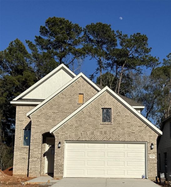 Front exterior of a new home in Two Step Farm, Montgomery, TX, highlighting curb appeal (Image 12).