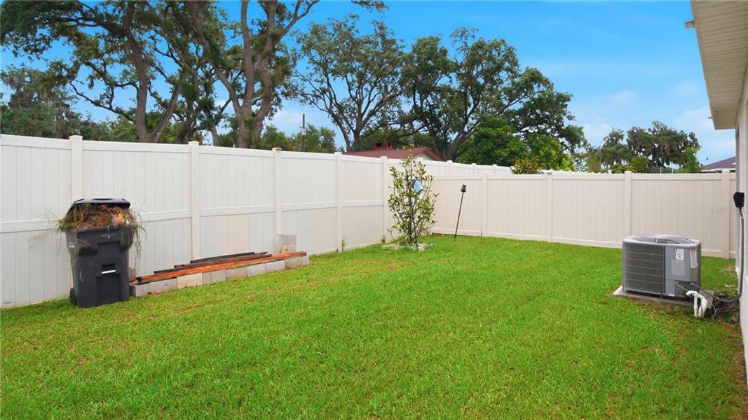Exterior details and patio area of a home in , Auburndale (Image 22).