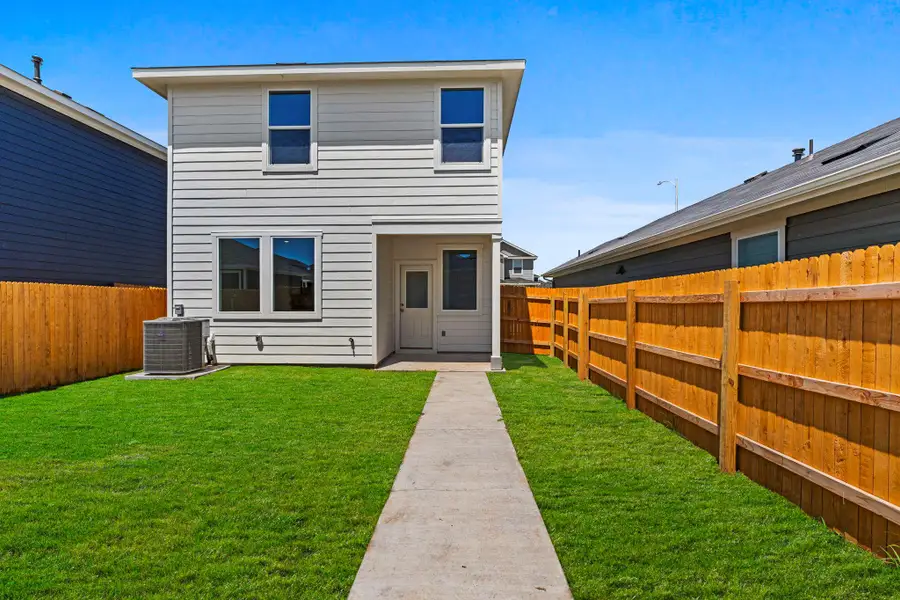 Exterior details and patio area of a home in Valverde, Bastrop (Image 4).