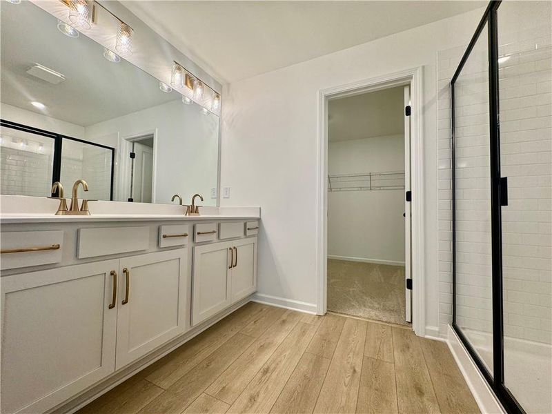 Furnished interior view inside a new home in Eastlyn Crossing, Flowery Branch (Image 10).