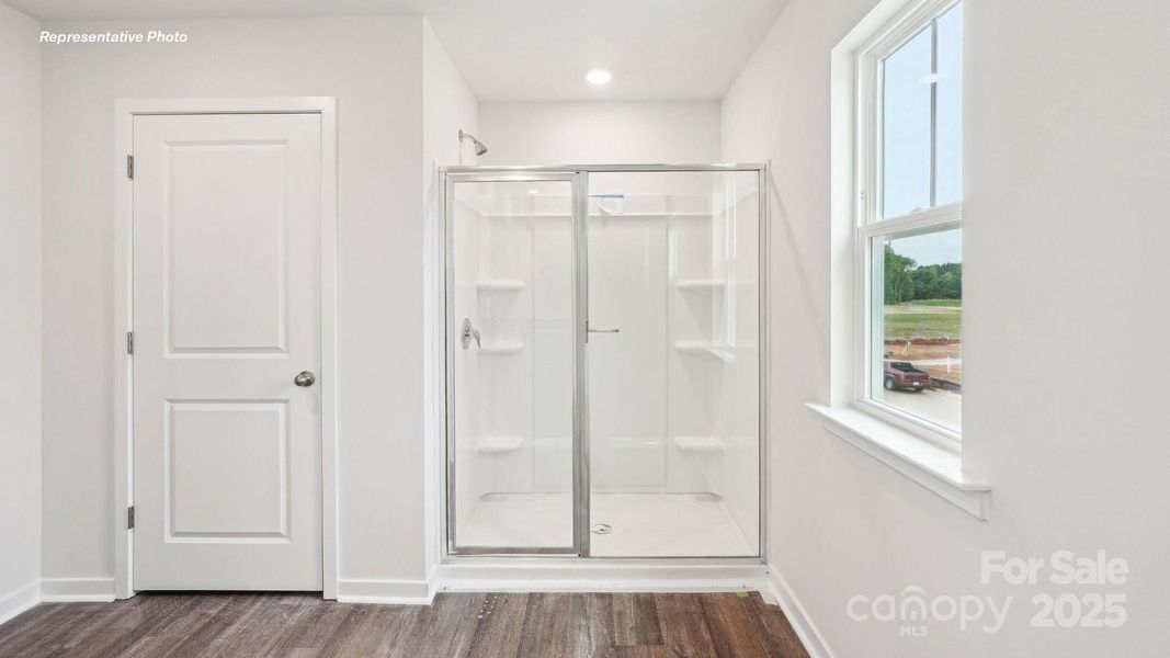 Spacious, unfurnished interior of a new home in Reedy Creek Preserve, Charlotte (Image 26).