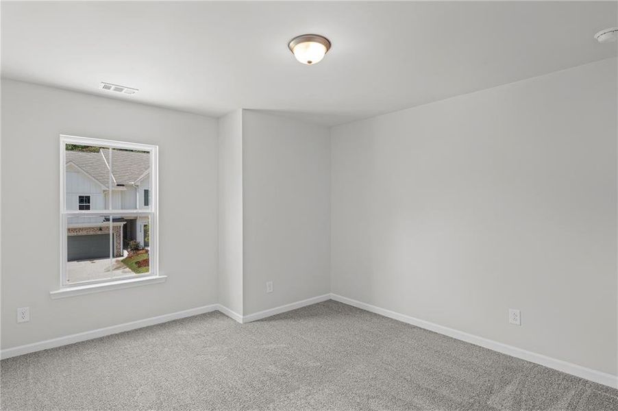 Spacious, unfurnished interior of a new home in Ansley Towns, Cumming (Image 14).