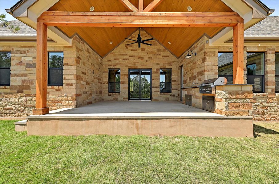 Rear patio opens to the private back yard with plenty of room for a pool.