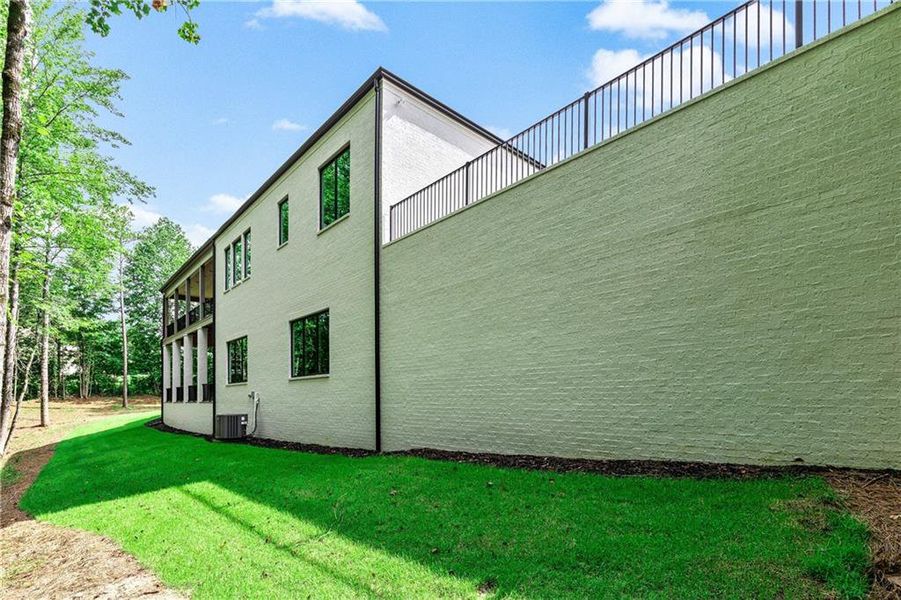 Exterior details and patio area of a home in , Newnan (Image 36).