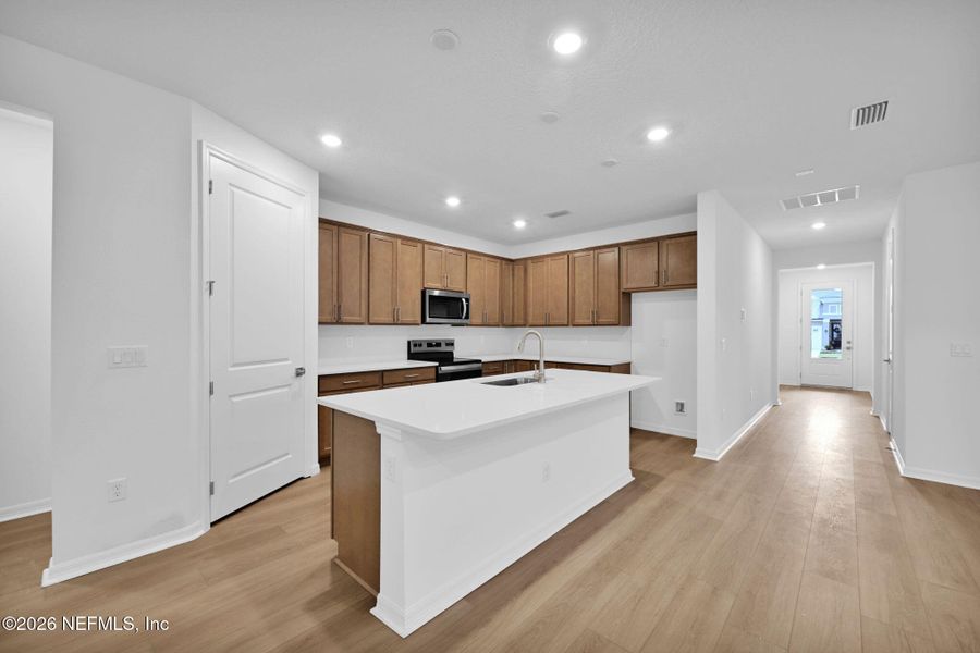 Furnished interior view inside a new home in Hyland Trail, Green Cove Springs (Image 9).