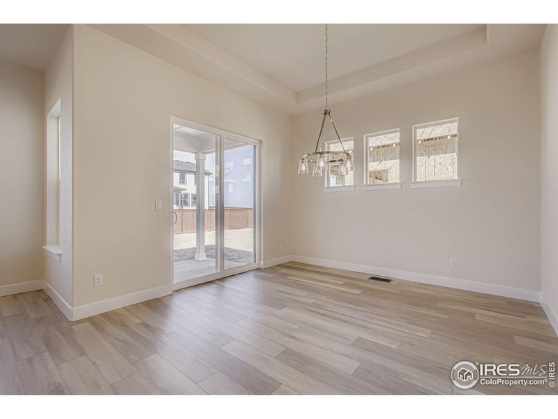 Spacious, unfurnished interior of a new home in RainDance National 60/70, Windsor (Image 23).