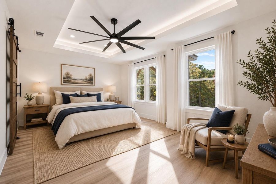 Virtually staged primary bedroom Recessed tray ceiling with integrated lighting and a contemporary ceiling fan Virtually staged primary bedroom Recessed tray ceiling with integrated lighting and a contemporary ceiling fan