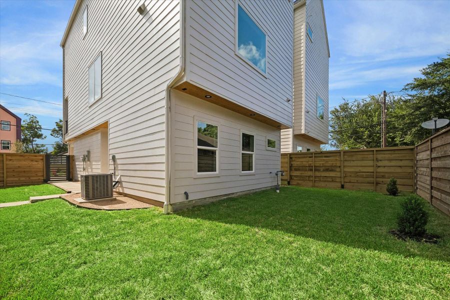 Exterior details and patio area of a home in , Houston (Image 24).