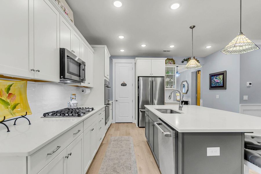 Furnished interior view inside a new home in K. Hovnanian's® Four Seasons at Lakes of Cane Bay, Summerville (Image 14).